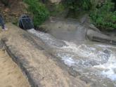 Storm water drain near ski club, at bottom of Simpson St, after heavy rain